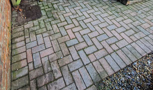 Before pressure cleaning block paving in the garden